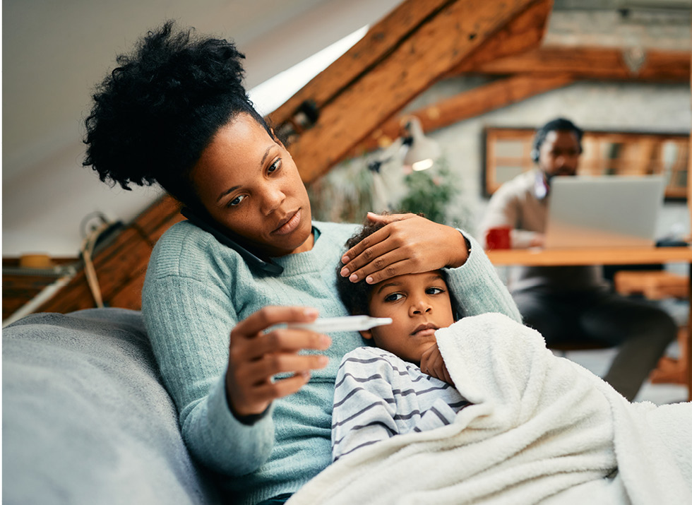 Mother cares for sick child