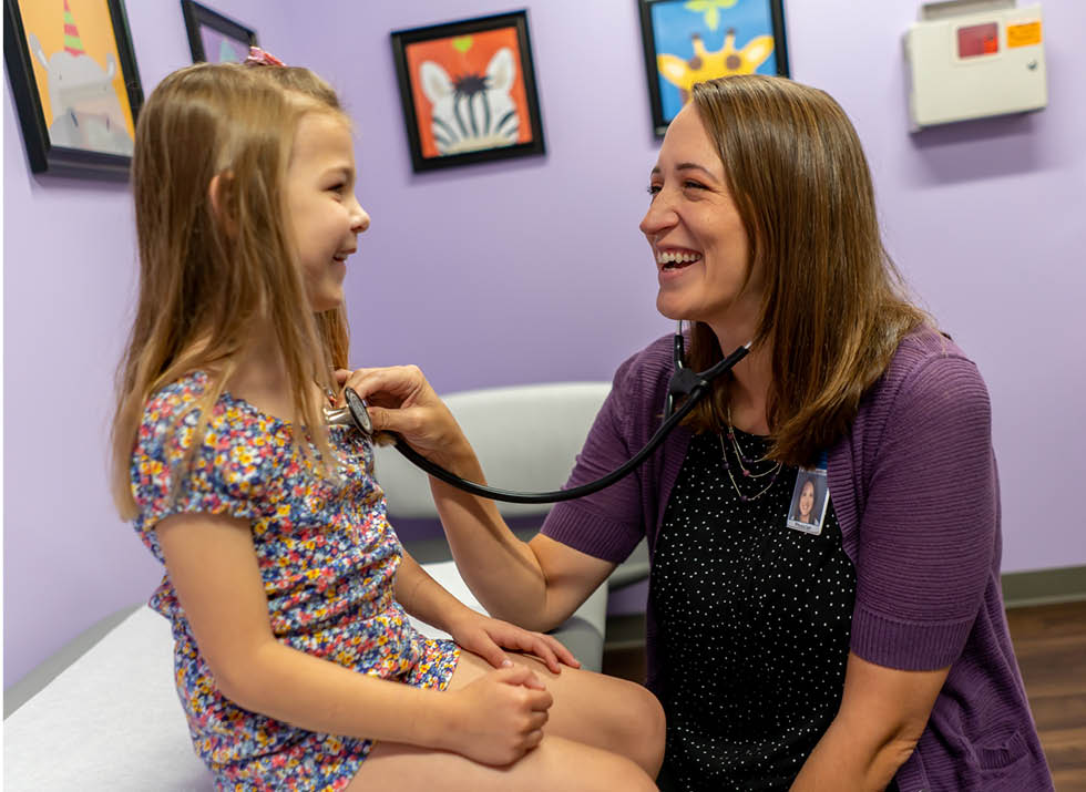 Dr Susan Halverson examines pediatric patient